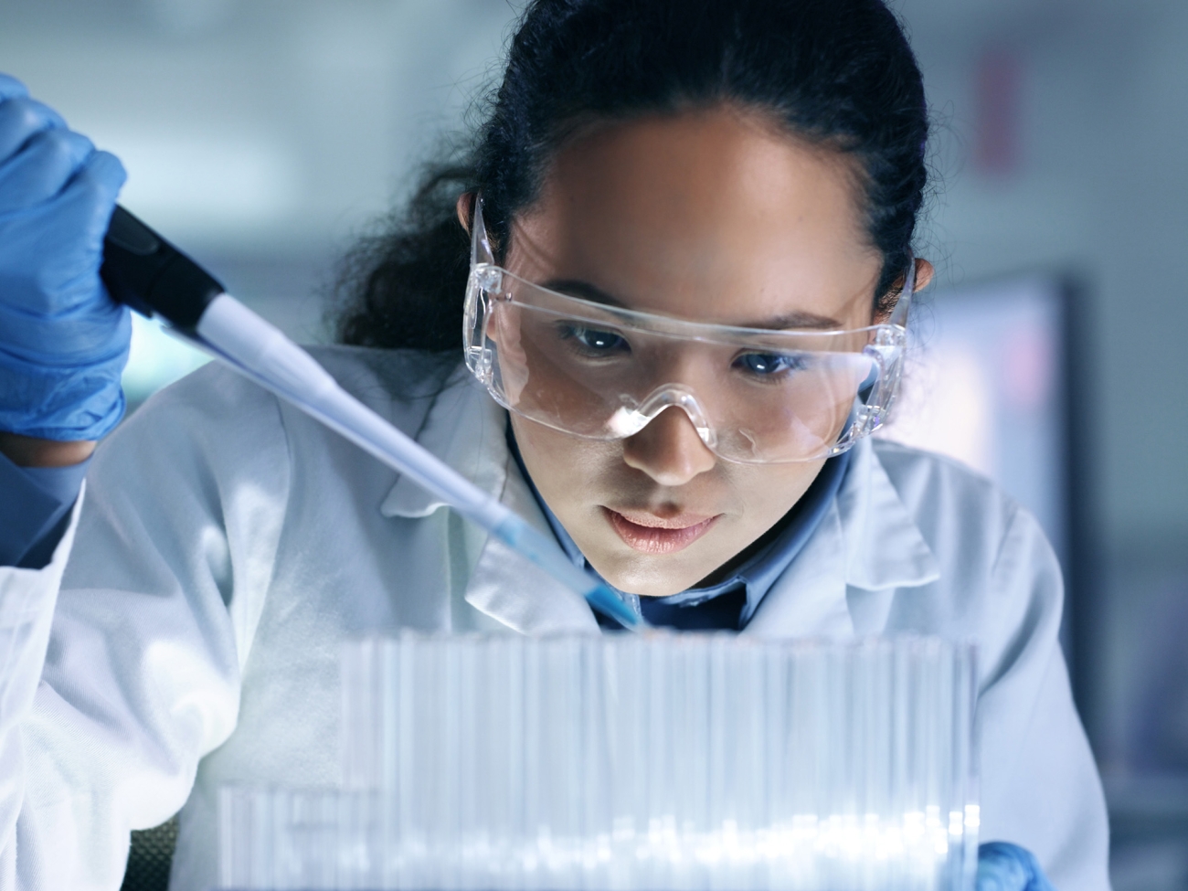 scientist with test tubes